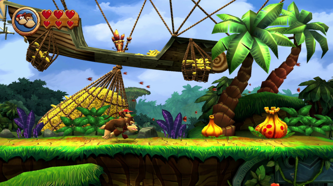 Donkey Kong Country Returns HD 게임의 스크린샷에는 Donkey Kong과 Diddy Kong이 열대 지형에서 오른쪽으로 달리는 모습이 나와 있습니다.