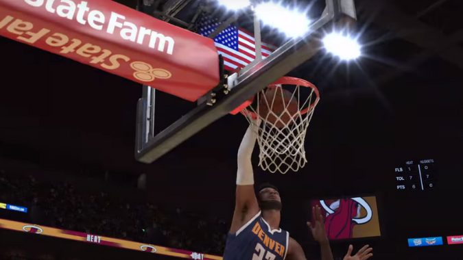 경기 중 농구공을 덩크하는 선수의 NBA 2k24 액션 샷