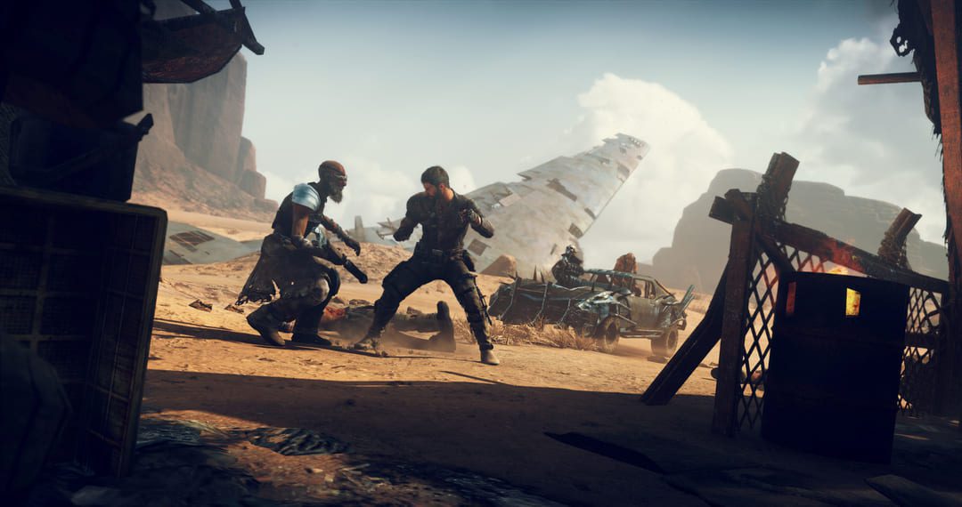 사막의 스크로퍼 가운데 두 캐릭터 사이의 직접 싸움을 보여주는 게임 Mad Max의 스크린 샷