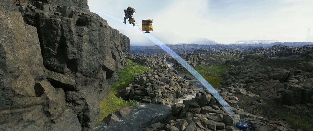 Sam Bridges가 강을 건너기 위해 사용하는 첨단 다리를 보여주는 Game Death Stranding 감독의 스크린 샷
